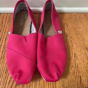 Women’s TOMS shoes size 9.